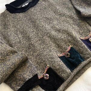 Cozy Knit Sweater with Colorful Pockets